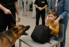 Security Dog Started Barking at a Child’s Backpack—What Was Inside Made the Whole Airport Go Silent Watch: 👇👇
